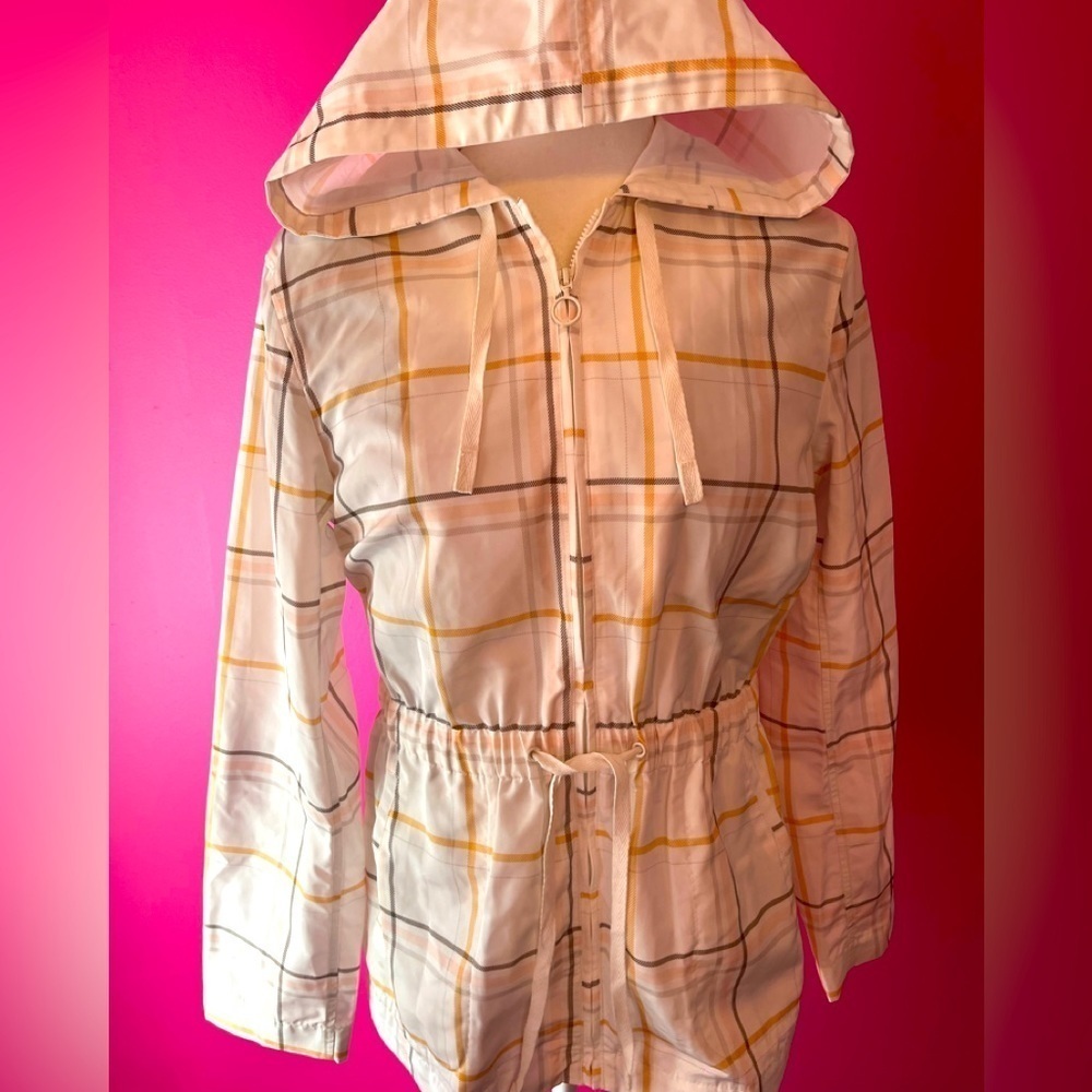 New plaid raincoat. Never worn. The tag fell off